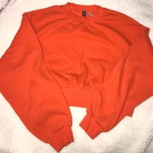 Orange cropped H&M sweatshirt